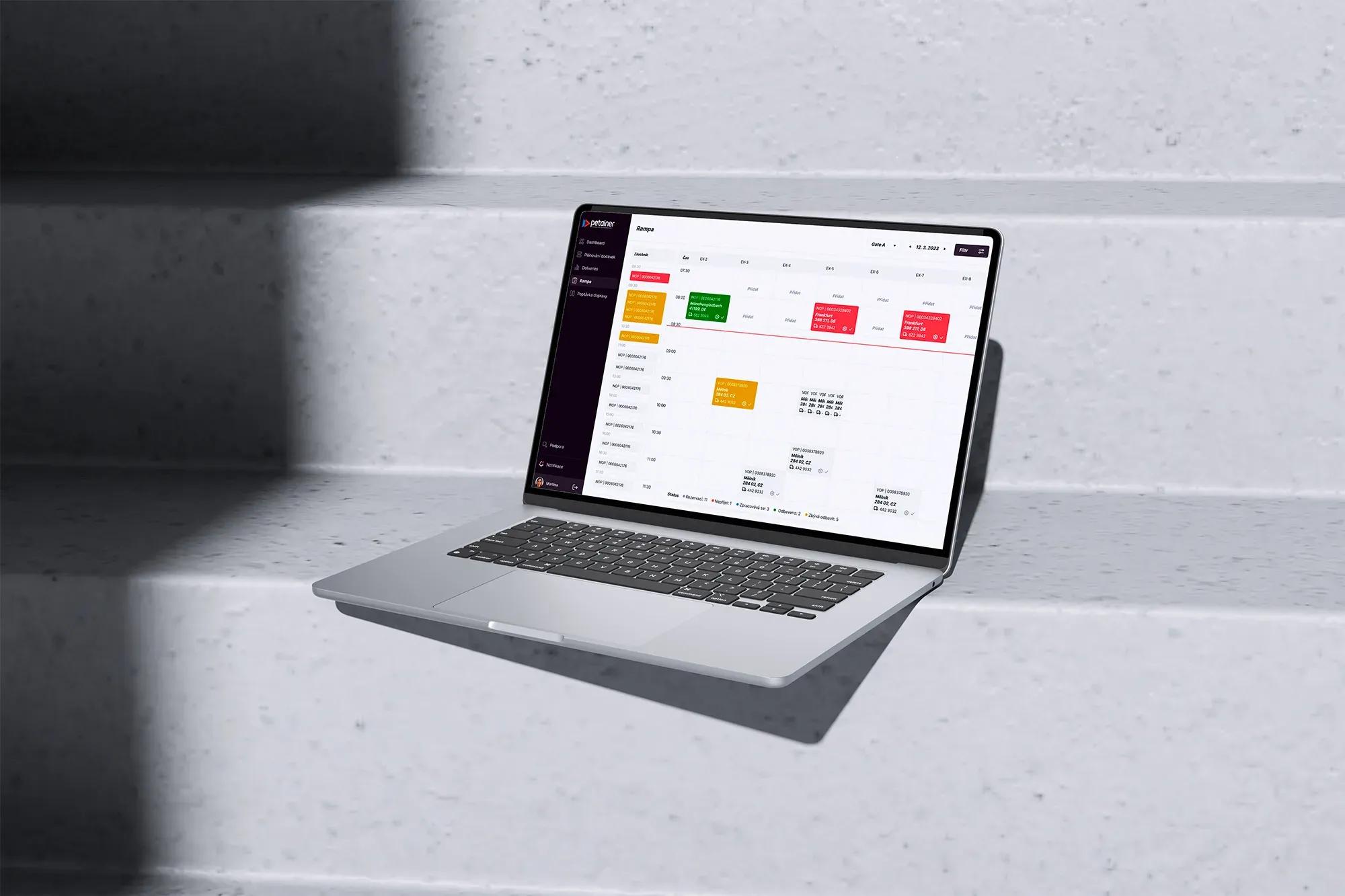 Notebook s plánem nakládacích ramp v systému COALO pro Petainer
